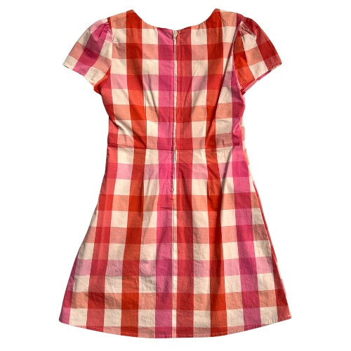 Pre-Owned Copper Key Plaid Dress Size: Little Girl Small Color: Orange, pink, and white plaid Features: Short sleeve, zipper closure Material: 98% Cotton, 2% Spandex Condition: Excellent Used Condition Our Families Attic
