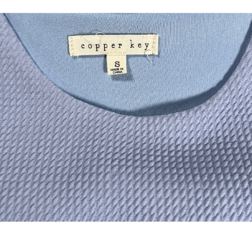 Copper Key girl's small blue dress with pink and orange flowers. Stretchy material, lined, and pleated skirt. Sleeveless. Round neck. tag view. Gently used excellent condition. Shop Our Families Attic.