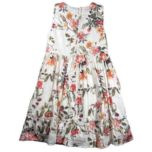 Pre-owned Edgehill Collection floral dress for little girls in size 6X. Features an off-white color with warm floral patterns, sleeveless design, ruffle hem, and back zipper closure. Made from 100% cotton with a fully attached liner. Gently used and in very good condition. Shop online at ourfamiliesattic.com
