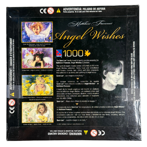Back of the Angel Wishes – Garden of Eden 1000-piece puzzle box by Kathleen Francour, showing additional artwork details, product information, and manufacturer text. Box shows light wear and is taped for security.