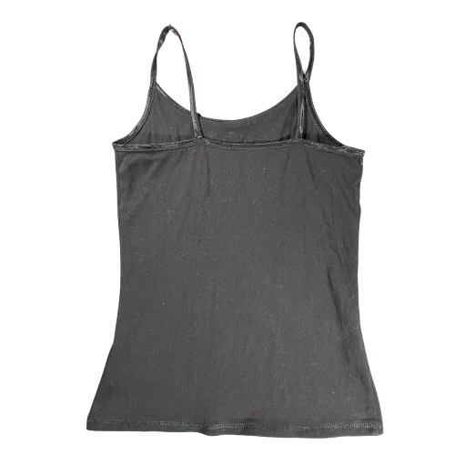 Preowned Back of Justice tank top. Color is black with spaghetti straps. Girls Size 6/7. This Justice tank top is a great wardrobe staple, perfect for layering or wearing on its own. Comfortable and stylish, it's ideal for casual days and playtime. Shop Our Families Attic.