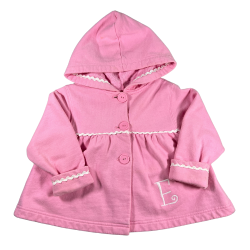 Pre-Owned Jacket with Hood Brand: Kelly's Kids Size: Toddler girl size 2 Color: Pink with white rick rack trim Features: Long sleeves with rolled cuffs, rick rack trim, soft and light, hood, pink button front with the letter "E" embroidered in white Material: 60% Cotton, 40% Polyester Condition: Gently used condition with minor discoloration. Online thrift store - Our Families Attic