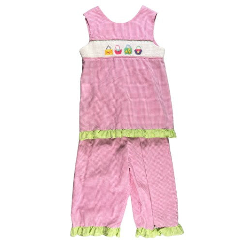 Pre-Owned Smocked Top and Pants Set Brand: Mom & Me Size: Little girl 6X Color: Pink and white gingham with embroidered purses/bags, and green gingham checkered Features: Sleeveless, 2" shoulder, smocking and embroidery on the top, ruffle trim, 2-button foldover back, elastic waist Material: 65% Cotton, 35% Polyester Condition: Excellent Used. Online thrift store - Our Families Attic