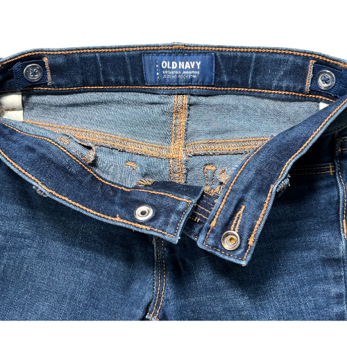Pre-owned Old Navy Rockstar Jeggings for little girls in size 6 Regular. Dark wash denim with an adjustable waist, belt loops, two back pockets, faux front pockets, and a zipper with snap closure. Made from a blend of cotton, polyester, spandex, and other materials. Very good, gently used condition. Shop at www.ourfamiliesattic.com