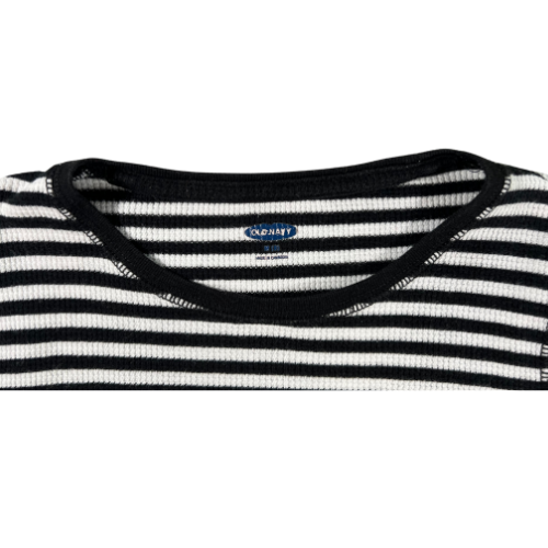 Pre-Owned Long Sleeve T-Shirt Brand: Old Navy Size: Big girl size 8 Color: Black and white stripes Features: Long sleeves, round neck, cute stripes, ribbed Material: 60% Cotton, 40% Polyester Condition: Gently used, good condition. Online thrift store - Our Families Attic