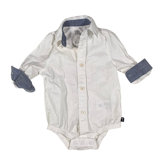 Blue jean trim on collar and wrist of baby onesie