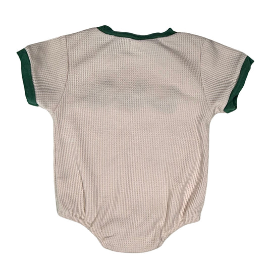 Cream baby onesie with green trim back view