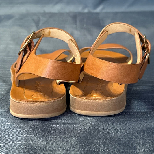 Back view of Cat & Jack girls’ tan-brown sandals showing the heel straps.