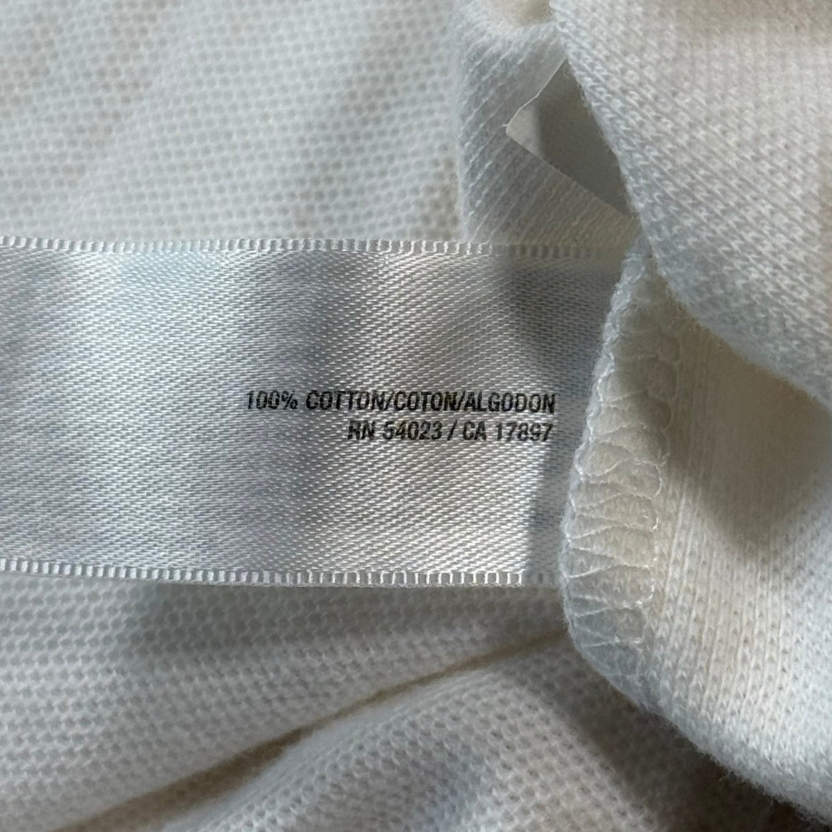Old Navy boys white long-sleeve polo shirt 100% cotton care label