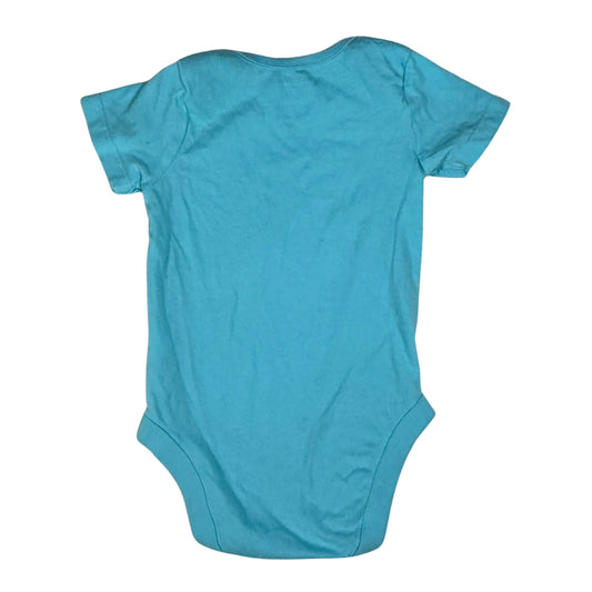 Baby boy turquoise onesie with Family Vacay beach graphic back view