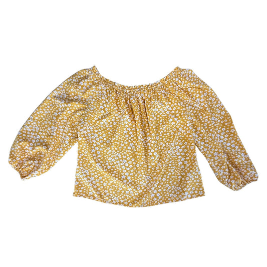 Back view of yellow floral long sleeve blouse
