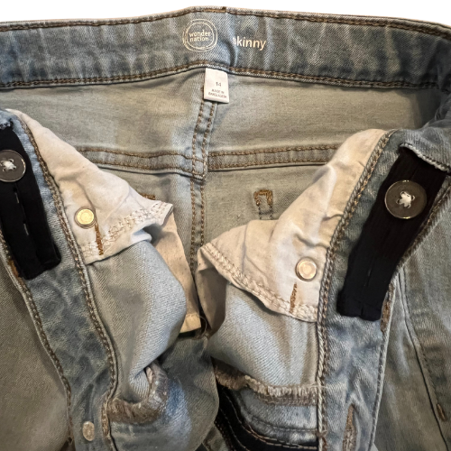 Wonder Nation Skinny Stretchy Jeans Light Wash Girl Size 14 Light Blue Jean Wash Stretchy, Adjustable Waist Button & Zipper Closure 5-Pocket Design Condition: Well-Loved, hole/rip in the knee & a few stains, front - Our Families AtticWonder Nation Skinny Stretchy Jeans Light Wash Girl Size 14 Light Blue Jean Wash Stretchy, Adjustable Waist Button & Zipper Closure 5-Pocket Design Condition: Well-Loved, hole/rip in the knee & a few stains, waistband - Our Families Attic