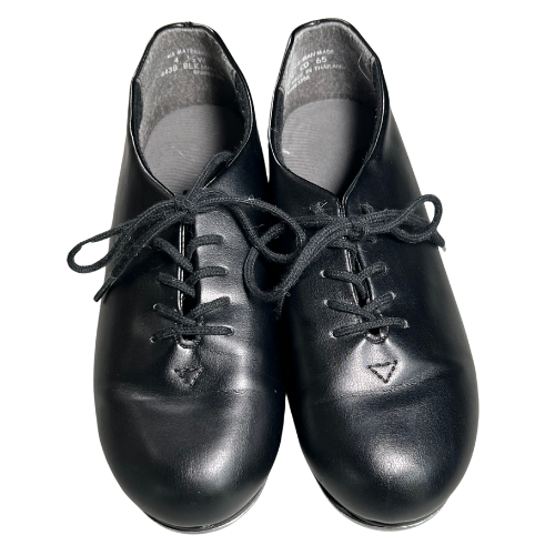 Pre-owned Capezio Tele Tone Tap Shoes in black, size 4.5W for girls, available at Our Families Attic. These gently used shoes feature a durable leather upper and Tele Tone taps for a clear sound, making them ideal for dance classes and performances!