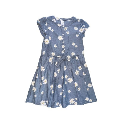Pre-Owned Blue Denim-Look Dress  Brand: Carter's Kid Size: Little Girl 6-6x Color: Light blue (denim look) with white daisy print Features: Cap sleeve, lightweight, front top button closure, tie in front Material: 100% Cotton Condition:   Gently used. There are a couple of very small snags on the front of the skirt. Used clothes. Our Families Attic.