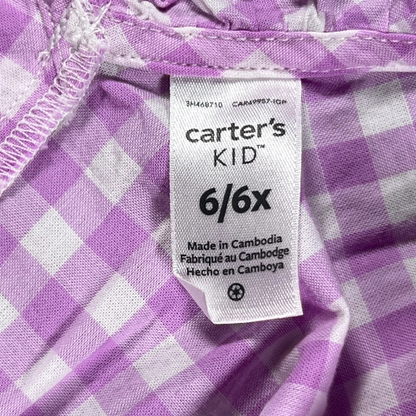 Pre-owned Carter's KID Lavender Gingham Dress for little girls, size 6/6X, featuring a lavender and white gingham check pattern, sleeveless design, ruffled arm hems and neckline, and an elastic waist, available at Our Families Attic.
