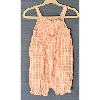 Back view of Carter's orange and white gingham baby romper with oversized bow, gathered waist, and ruffled leg openings.