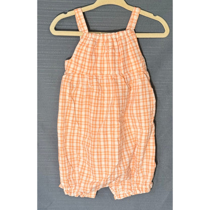 Front view of Carter's orange and white gingham baby girls romper, size 12 months, with shoulder straps, gathered waist, and elasticized leg openings.