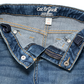 Pre-owned Cat & Jack super skinny jeans for little girls in size 6. Medium wash denim with adjustable waist, two back pockets, faux front pockets, and zipper and snap closure with a faux button. Made from a blend of cotton, recycled polyester, lyocell, and rayon. Gently used condition. Shop at www.ourfamiliesattic.com