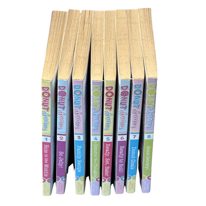 Spines of Donut Dreams books 1 through 8 by Coco Simon arranged in reading order.