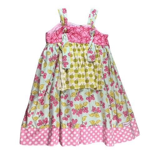 Pre-Owned Pink and White Polka Dot Dress Brand: Heather Hill Size: Little Girl 6 (an estimate on size) Color: Pink, white, and green with polka dots, cherries, apple, and floral print. Features: Sleeveless, 1.5" shoulder strap, cute knot on the straps, small apron, wide hem Material:  Cotton Condition:  Good,  Gently used. There is a small mark on the back at the hem. Used clothing. Our Families Attic