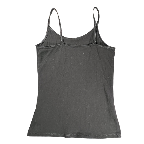 Preowned Back of Justice tank top. Color is black with spaghetti straps. Girls Size 6/7. This Justice tank top is a great wardrobe staple, perfect for layering or wearing on its own. Comfortable and stylish, it's ideal for casual days and playtime. Shop Our Families Attic. 