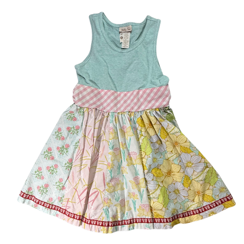 Colorful dress with a patterned skirt on a white background