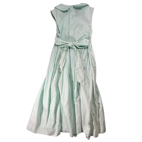 Light green dress with a belt on a white background