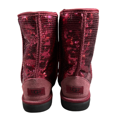 Back view of UGG Classic Sparkle Sequin Boots – RBR Red with UGG logo heel patch