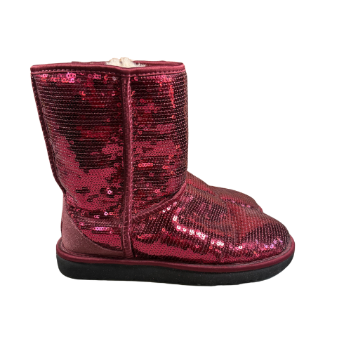 Side view of UGG Classic Sparkle Sequin Boot in RBR Red showing full sequin exterior and plush trim