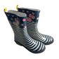 Pre-owned Time & True ladies rain boots, size 7, featuring a dark blue background with pink and yellow floral print on the upper section and bold white and dark blue stripes on the lower section. Boots include yellow pull loops and yellow accents on the soles. Shop ourfamiliesattic.com