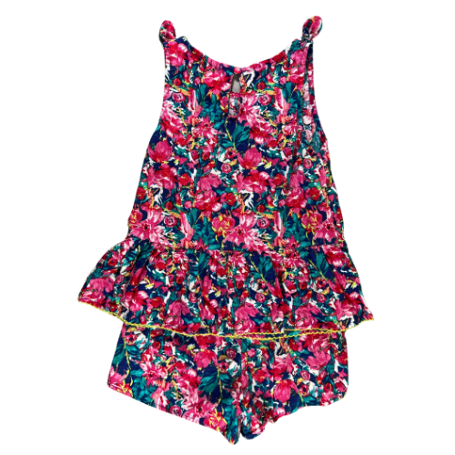 Pre-Owned 2 Piece Top and Shorts Bright Floral Set Brand: Vince Camuto Size: Big Girl 7 Color: Bright pink and blue floral Features: Sleeveless with 1" shoulder, bow on shoulders, button closure on back of the top, elastic waist shorts. Material: 55% Linen, 45% Rayon Condition:  Excellent used. Online thrift store - Our Families Attic
