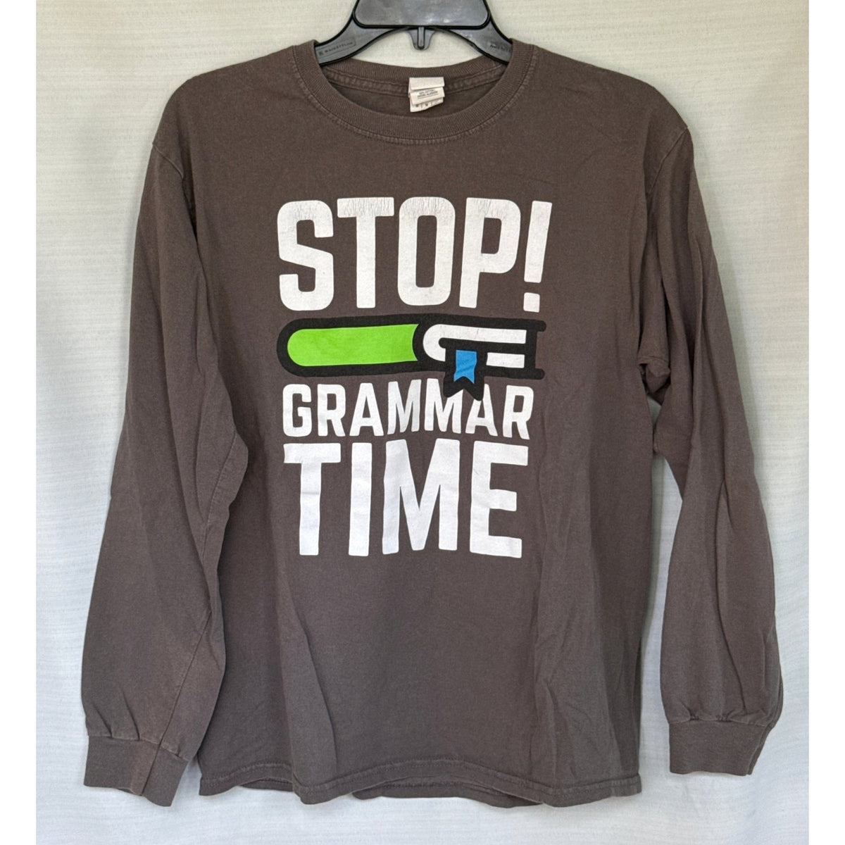 Front of Gildan adult medium faded charcoal-gray long-sleeve shirt with colorful Stop Grammar Time book graphic