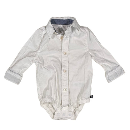 Baby boy white collared dress shirt onesie with blue trim front view