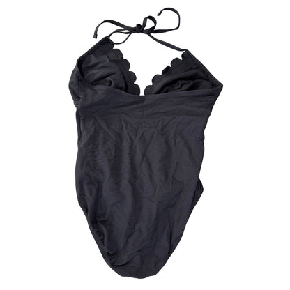 Black one piece swimsuit with scalloped neckline and halter tie