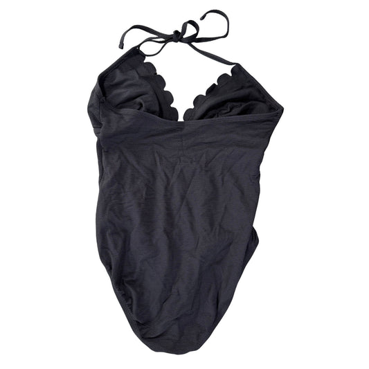 Black one piece swimsuit with scalloped neckline and halter tie