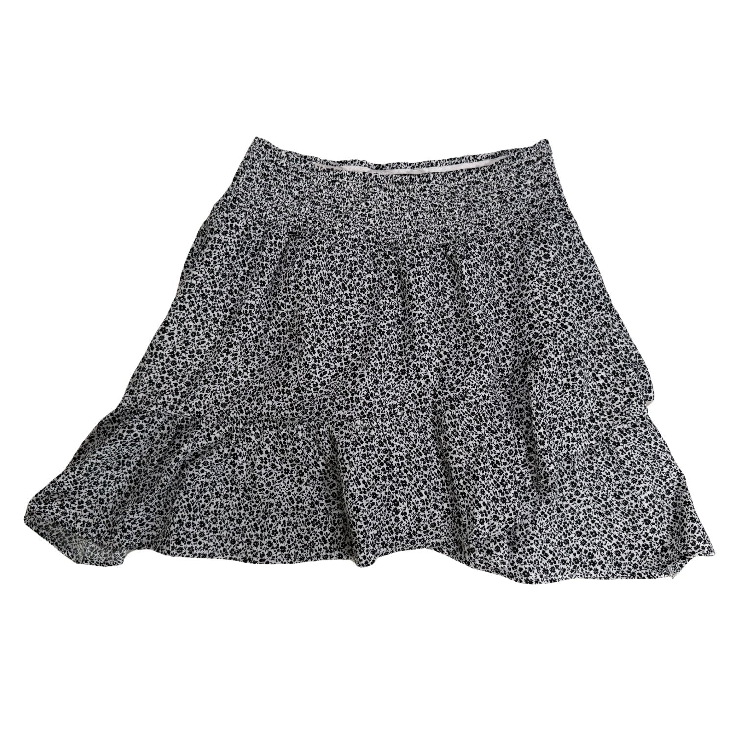 Ruffled skirt and smocked waistband detail