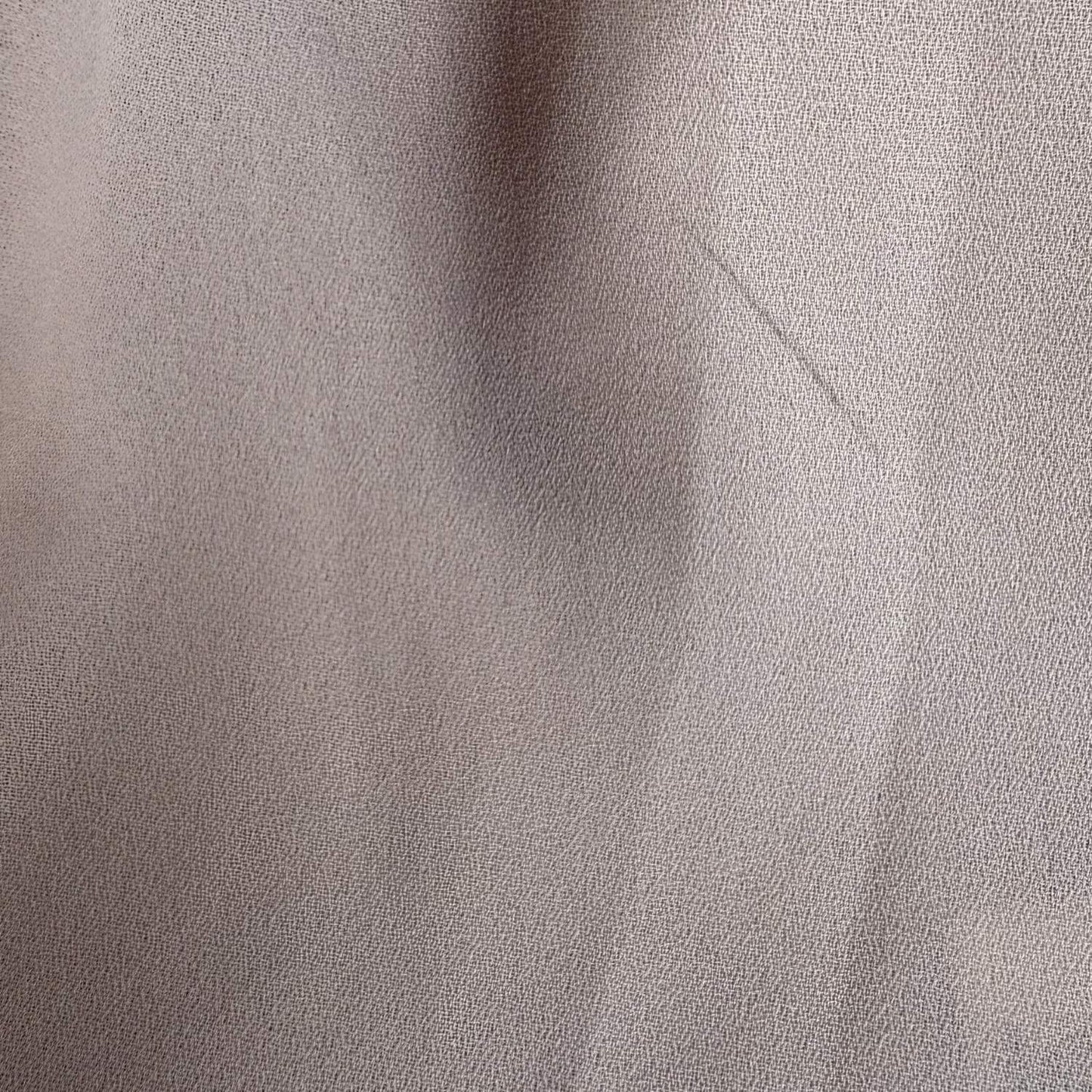 Close up of ruffle sleeve and lightweight fabric