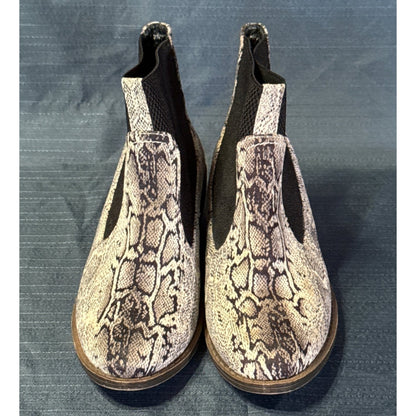 Front view of Corkys snake-print ankle boots showing almond toes and contrasting black elastic panels.