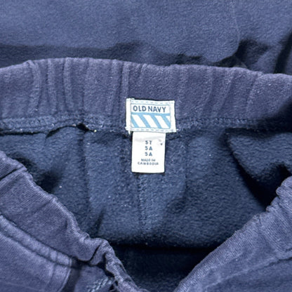 Old Navy size 5T brand and size tag inside the blue sweatpants.