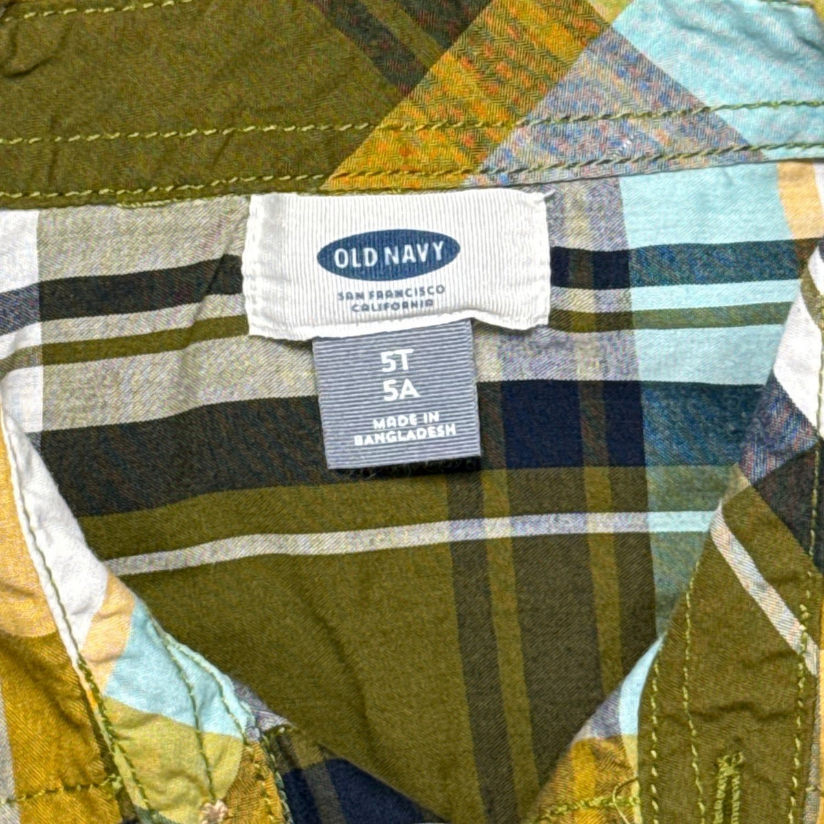 Old Navy plaid button-up shirt label showing boys size 5T