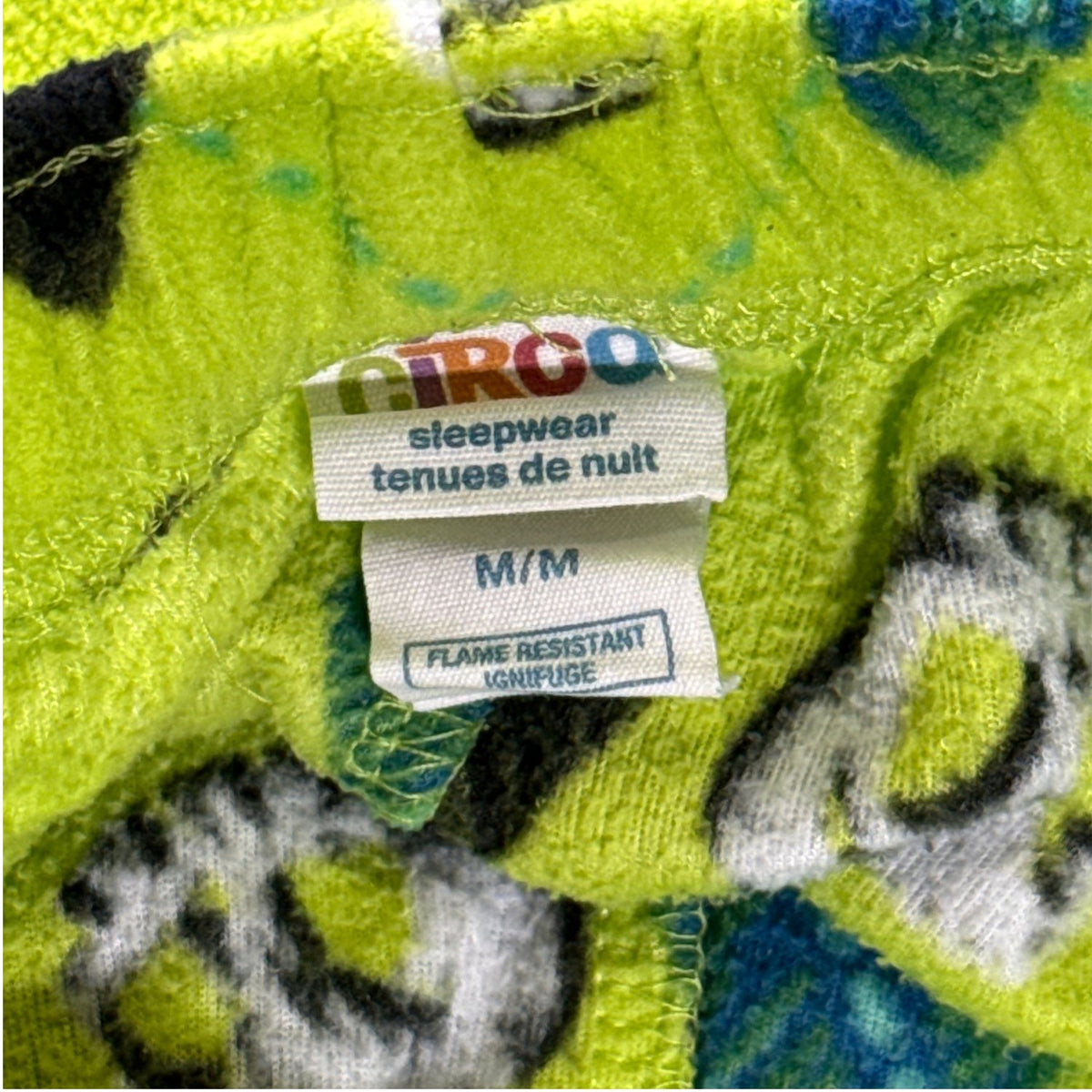 Circo boys pajama pants tag showing size M/M and flame-resistant sleepwear labeling