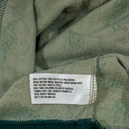 Cat & Jack baby boy clothing material tag showing 60% cotton and 40% recycled polyester
