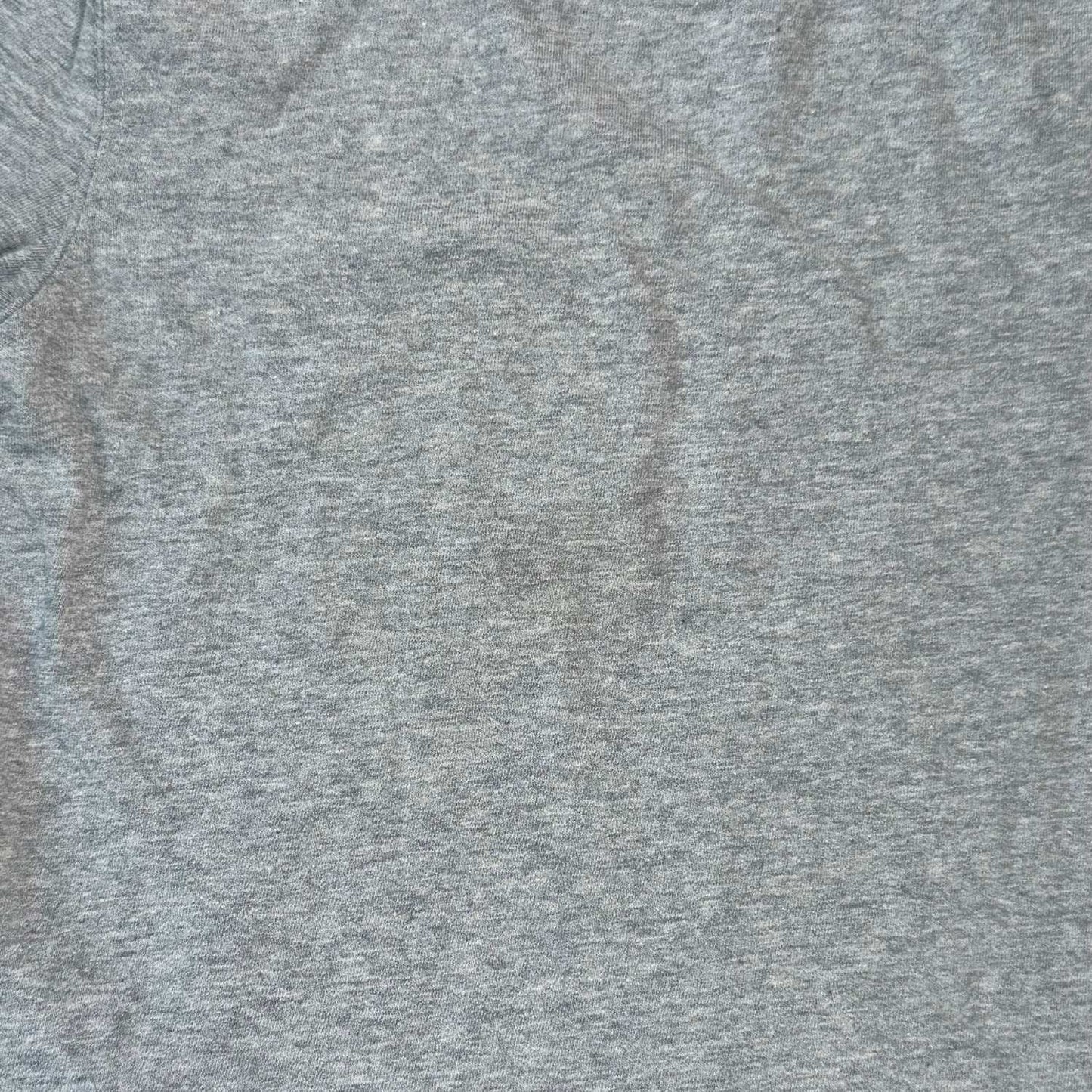 Close-up of light stain on front of Cherokee boys size 5T heather gray long sleeve shirt