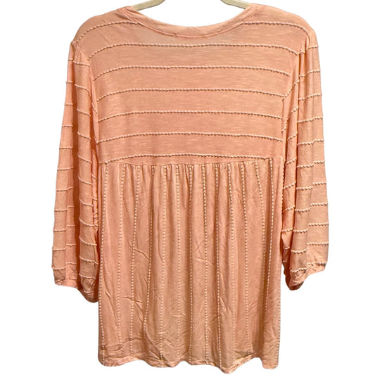 Back view of Chris & Carol light peach pink babydoll top with stitched stripe texture and relaxed fit.