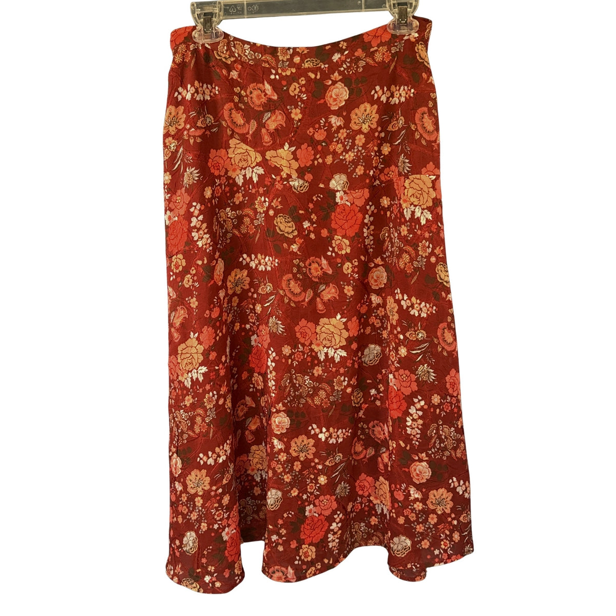 Back view of Christopher & Banks red and orange floral skirt showing gently flared silhouette and flowing hemline.