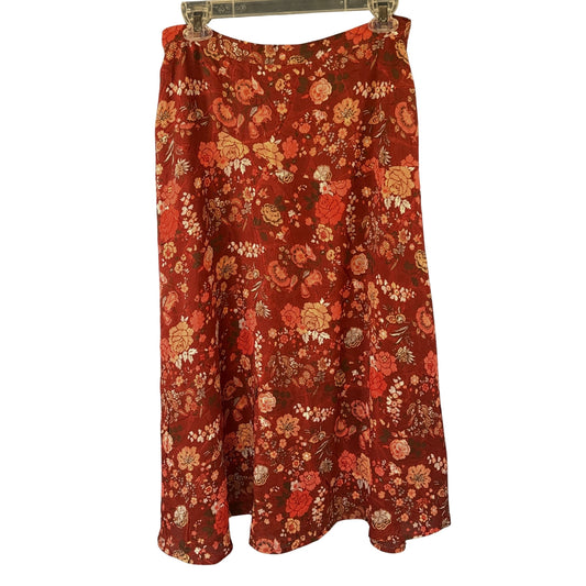 Back view of Christopher & Banks red and orange floral skirt showing gently flared silhouette and flowing hemline.