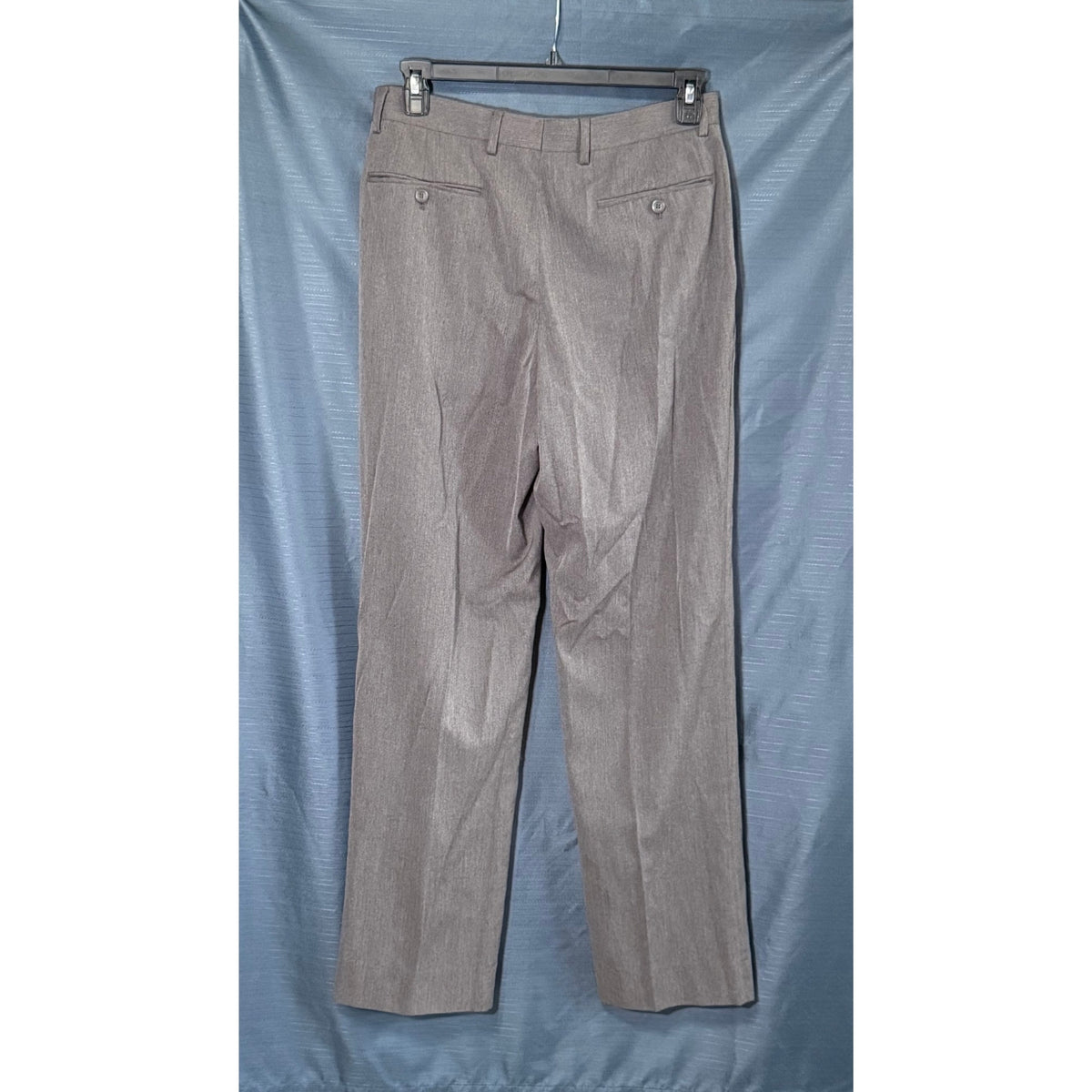 Back view of David Taylor men's gray dress pants showing belt loops and two buttoned welt pockets.