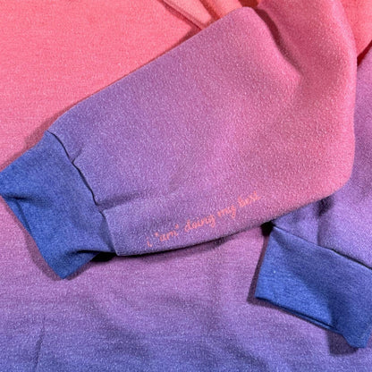 Right sleeve of Doing My Best sweatshirt with I am doing my best printed detail