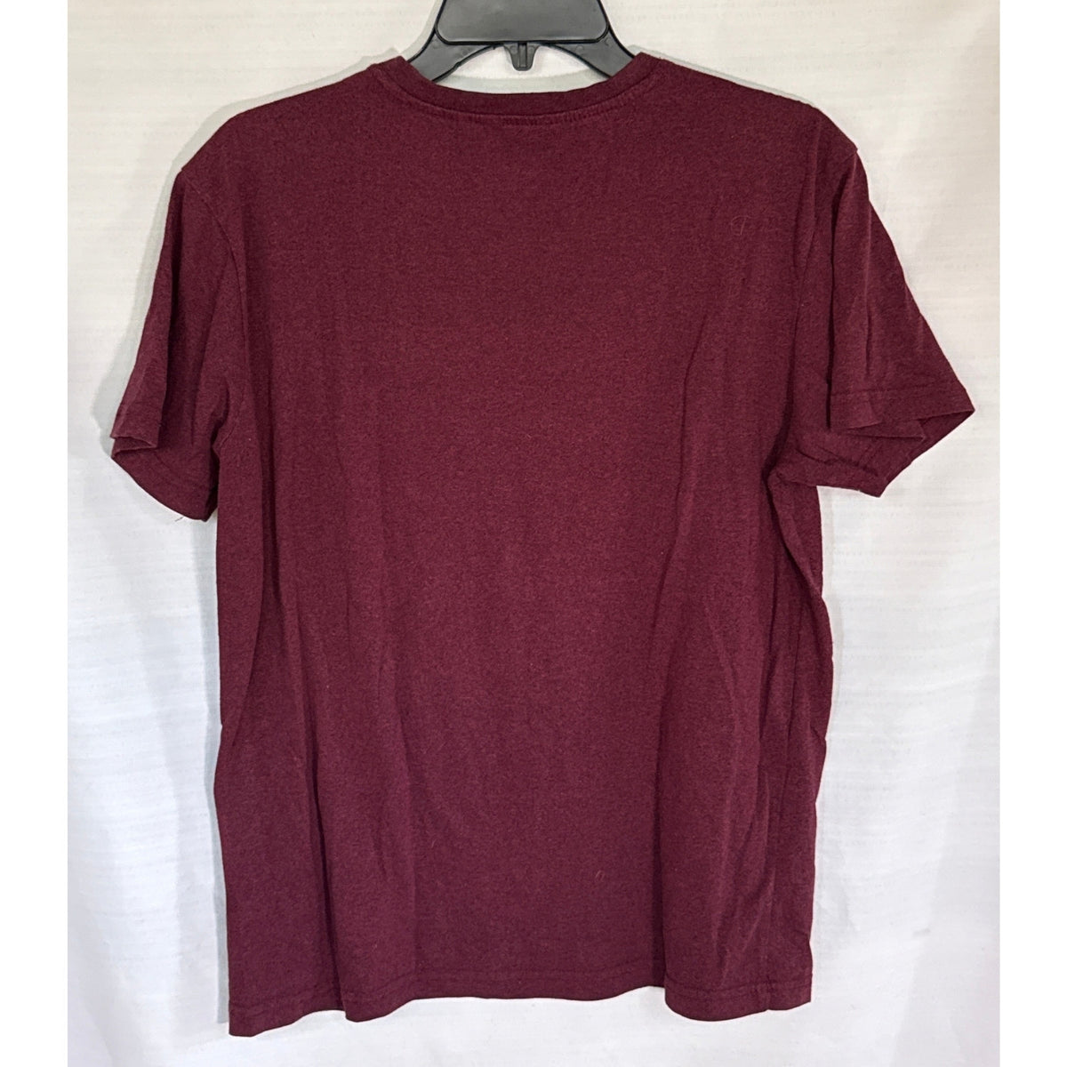 Back front view of burgundy Ecko Unltd. men’s medium T-shirt with a V-neck, short sleeves, and small shoulder logo.