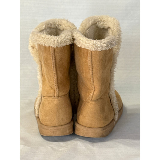 Back view of FabKids tan short boots showing rear stitching, cream fuzzy lining, and flat heels.